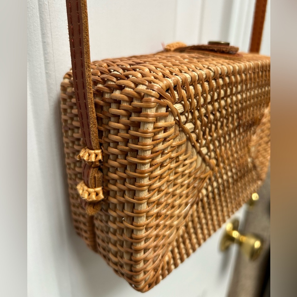Stylish Rectangular Tan Woven Crossbody Bag 6x7.5x3” w/ 24” drop strap.